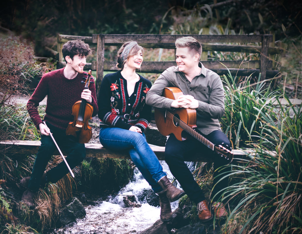 The Wilderness Yet is a folk trio combining the acclaimed talents of folksinger Rosie Hodgson, traditional fiddler Rowan Piggott, and guitarist-flautist Philippe Barnes. "Down-to-earth folksong from the heart of the English & Irish traditions... 